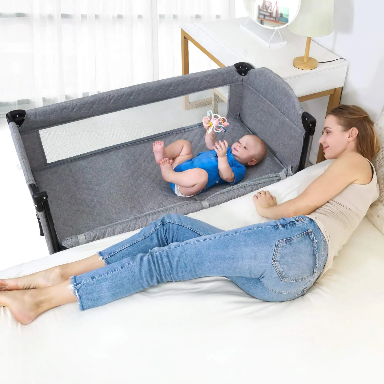 Mother and baby in crib